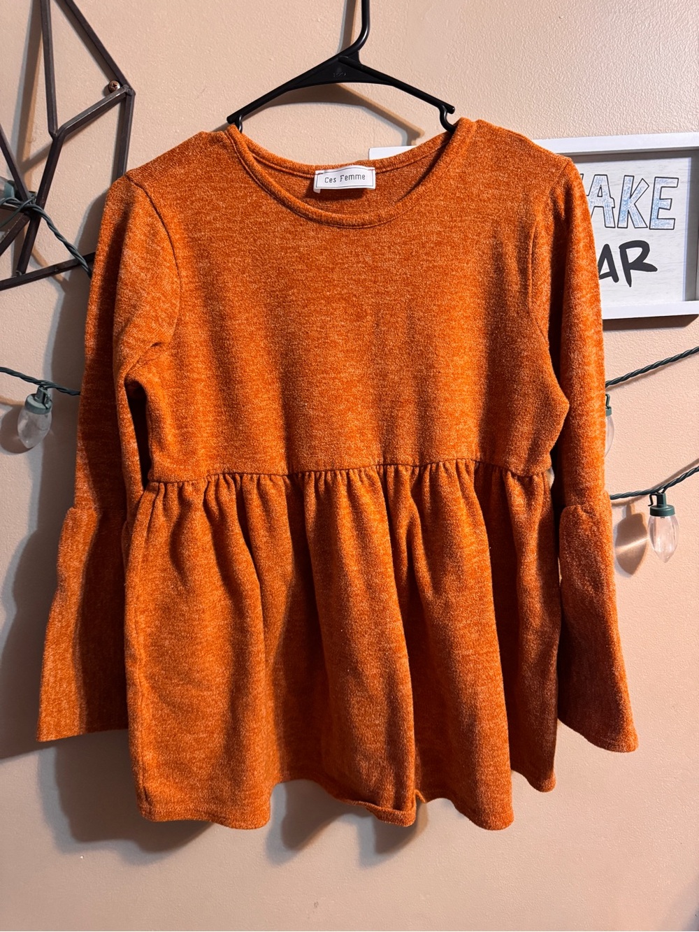 Ces Femme Burnt Orange Peplum Long-Sleeve Top